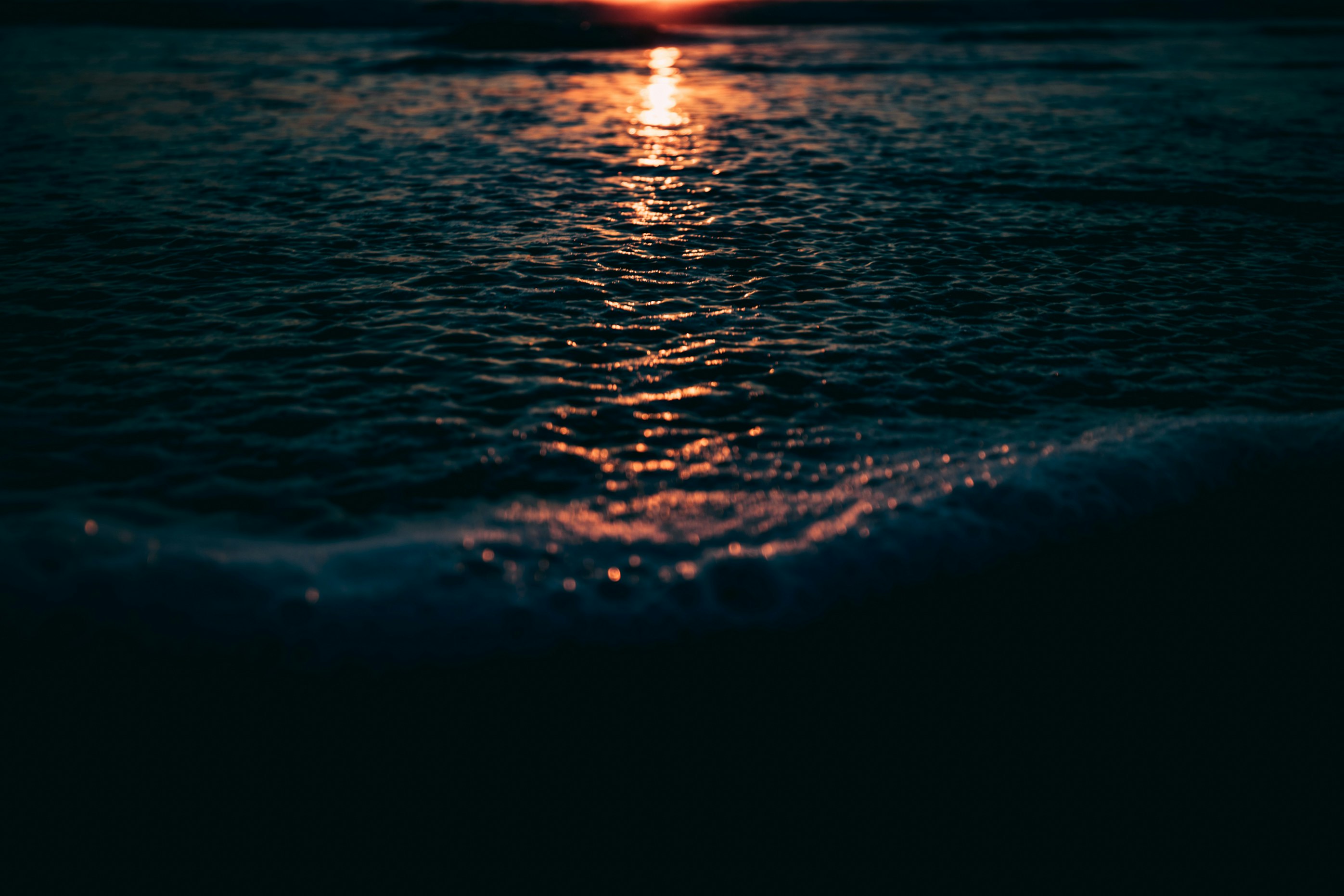 body of water during golden hour